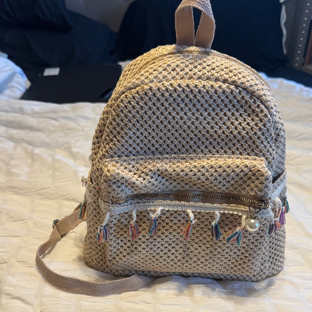 Chic Woven Backpack with Colorful Tassels